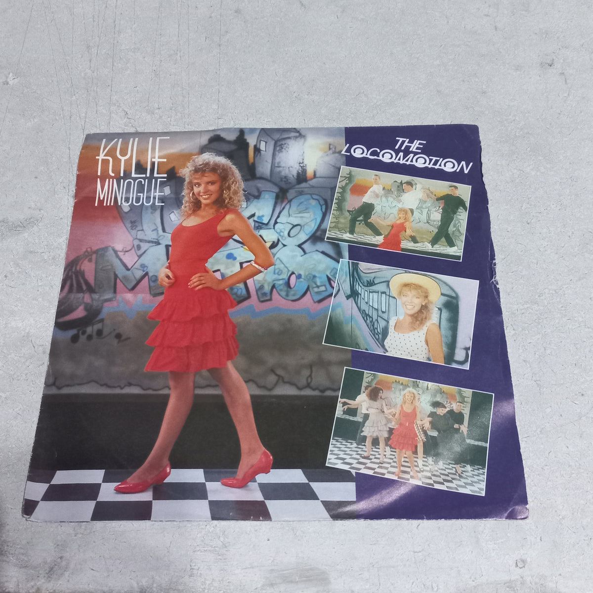 Kylie Minogue - The Loco-Motion / I'll Still Be Loving You (7'') Simple VG+