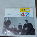 Level 42 - Lessons In Love / Hot Water (Live) (7'') Simple VG+