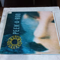 Siouxsie And The Banshees* - Peek-A-Boo (12", Single) (Wonderland (3), Polydor - SHEX 14, 887 642-1 Y) - MAXI VG+ O Nm