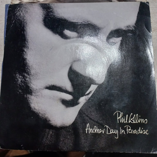 Phil Collins Another Day in Paradise