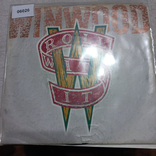 Steve Winwood Roll With It
